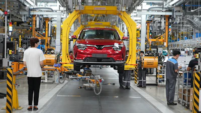 Workers assemble a car at a Vinfast factory in Hai Phong, Vietnam, on Sept. 29, 2023.