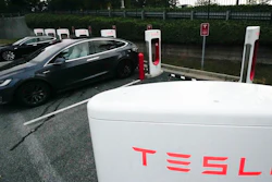 A Tesla vehicles charge, Wednesday, Sept. 27, 2023, in Woodstock, Ga. Tesla reports their earnings on Wednesday, Jan. 24, 2024.