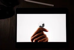 In this illustration photographed in La Habra, Calif., the AirTag tracking device is introduced during a virtual event held to announce new Apple products, Tuesday, April 20, 2021.
