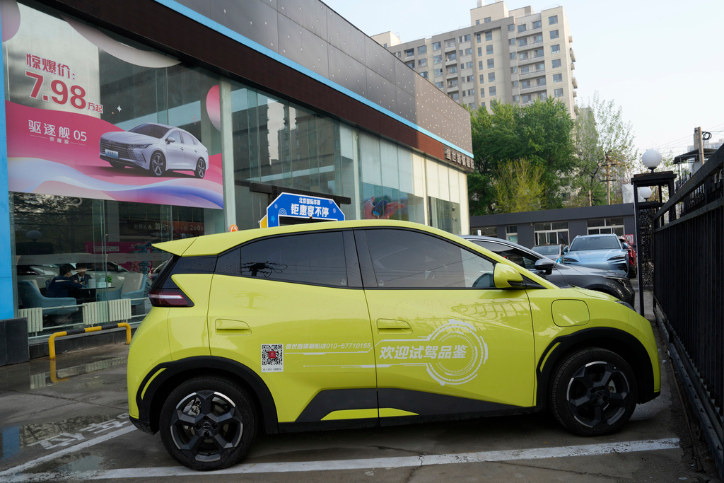 A Seagull electric vehicle from Chinese automaker BYD for test driving is parked outside a showroom in Beijing, Wednesday, April 10, 2024.