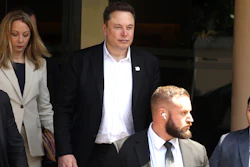 Elon Musk, center, arrives for the 10th World Water Forum in Nusa Dua, Bali, Indonesia on Monday, May 20, 2024.