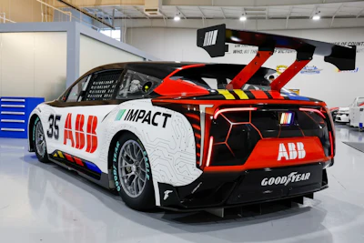 A prototype of the first electric racecar is displayed at the NASCAR R&D Center in Concord, N.C., Monday, July 1, 2024. The top motorsports series in North America partnered with Chevrolet, Ford, Toyota and electrification company ABB to demonstrate a high-performance electric vehicle and gauge fan interest in electric racing.