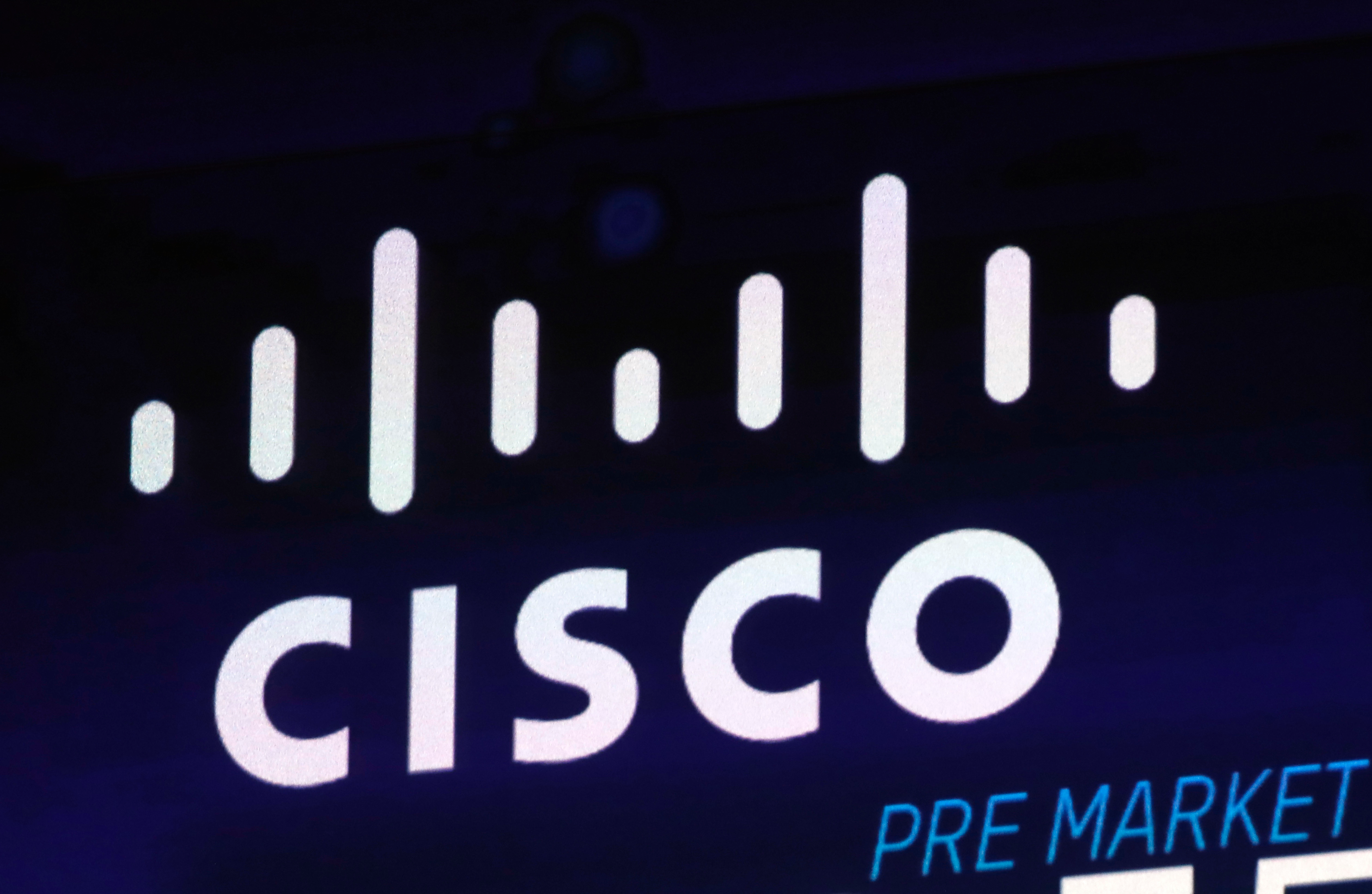 The Cisco logo appears on a screen at the Nasdaq MarketSite.