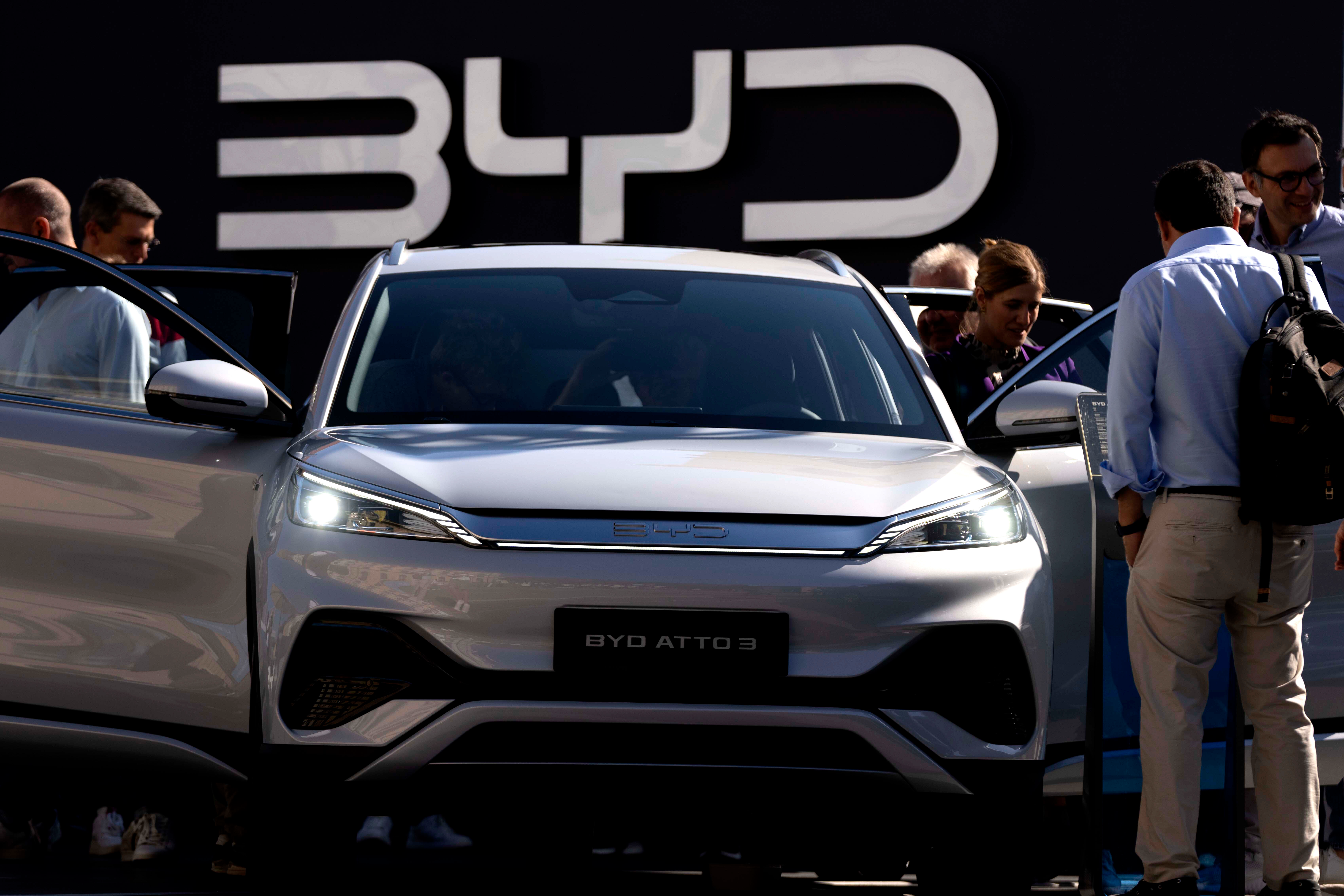 Visitors check the China made BYD ATTO 3 at the IAA motor show in Munich, Germany.