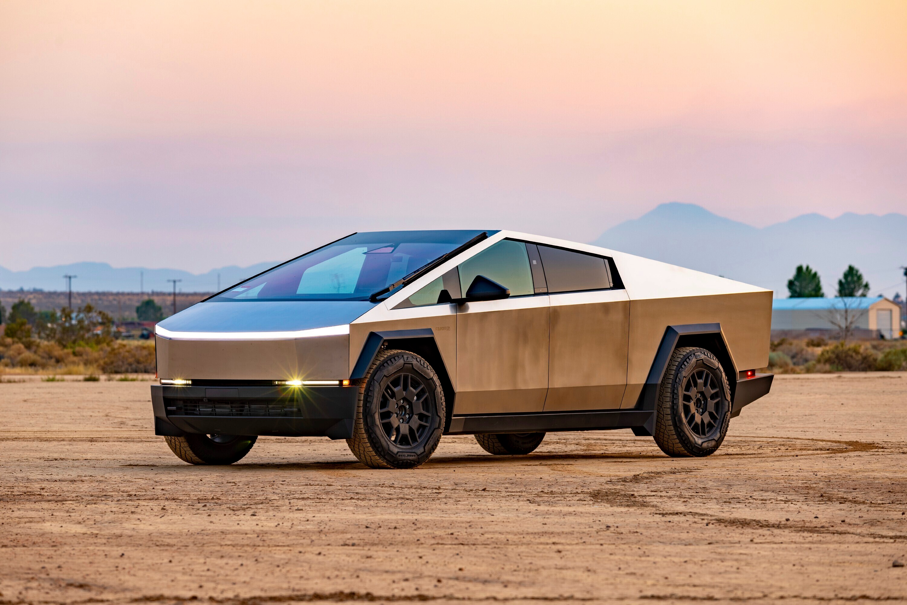 This photo provided by Edmunds shows the 2024 Tesla Cybertruck. The Cybertruck can drive more than 300 miles on a full charge and tow up to 11,000 pounds.