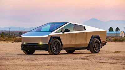 This photo provided by Edmunds shows the 2024 Tesla Cybertruck. The Cybertruck can drive more than 300 miles on a full charge and tow up to 11,000 pounds.
