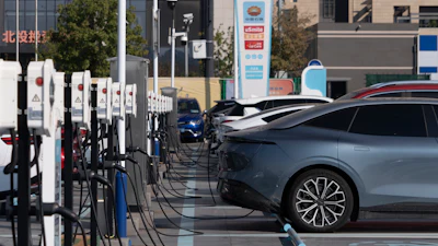 Electric vehicle charging stations are seen in Beijing, Friday, Oct. 11, 2024.