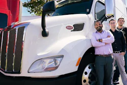 Mechanical and Aerospace Engineering Professor Subith Vasu and students pose with a PACCAR truck that may stand to benefit from Vasu’s hydrogen combustion engine research.