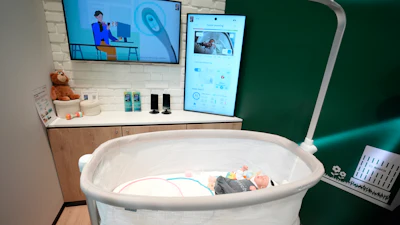The Bosch Revol Smart Crib is displayed at a Bosch booth during the CES tech show Wednesday, Jan. 8, 2025, in Las Vegas.