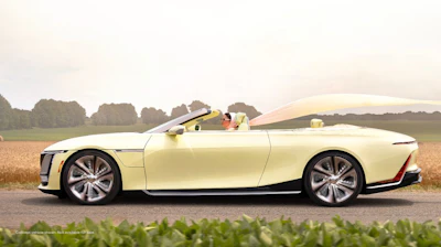 Driver side view of Cadillac SOLLEI concept vehicle in Manila Cream.