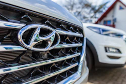 The logo on the grille of a Hyundai vehicle.