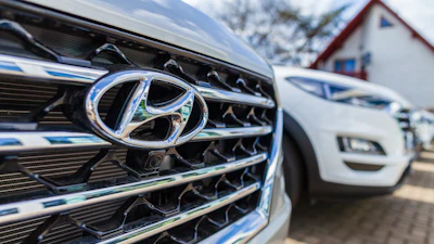 The logo on the grille of a Hyundai vehicle.