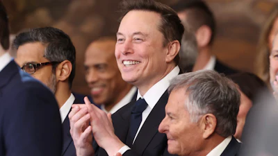Elon Musk listens as President Donald Trump speaks after taking the oath of office at the 60th Presidential Inauguration in the Rotunda of the U.S. Capitol in Washington, Monday, Jan. 20, 2025.