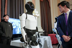 A Tesla robot is displayed as U.S. robotics companies look for congressional support to compete with Chinese companies, on Capitol Hill in Washington, Wednesday, March 26, 2025.