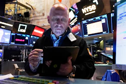 Trader Michael Urkonis works on the floor of the New York Stock Exchange, Thursday, April 17, 2025.