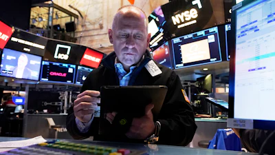 Trader Michael Urkonis works on the floor of the New York Stock Exchange, Thursday, April 17, 2025.