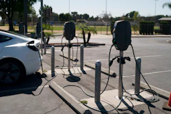 Electric vehicle chargers are seen in the parking lot of South El Monte High School in South El Monte, Calif., Aug. 26, 2022.