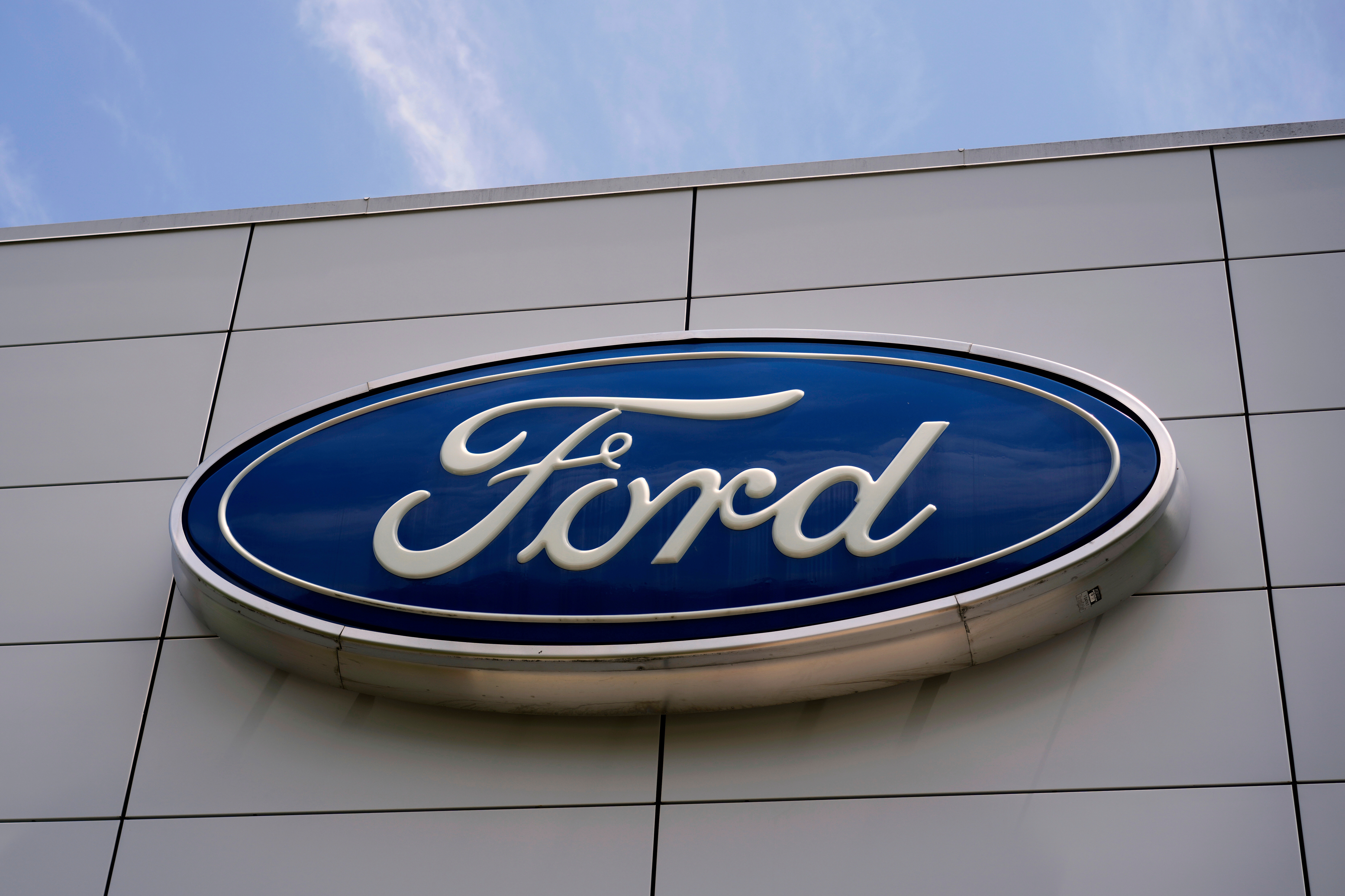 The Ford logo is seen above the entrance to the Ford Motor Company Kentucky Truck Plant, Wednesday, April 30, 2025, in Louisville, Ky.