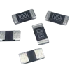 Surface-mount resistors in black and silver with printed resistance values