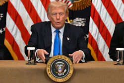 Presidential seal on podium during official government briefing