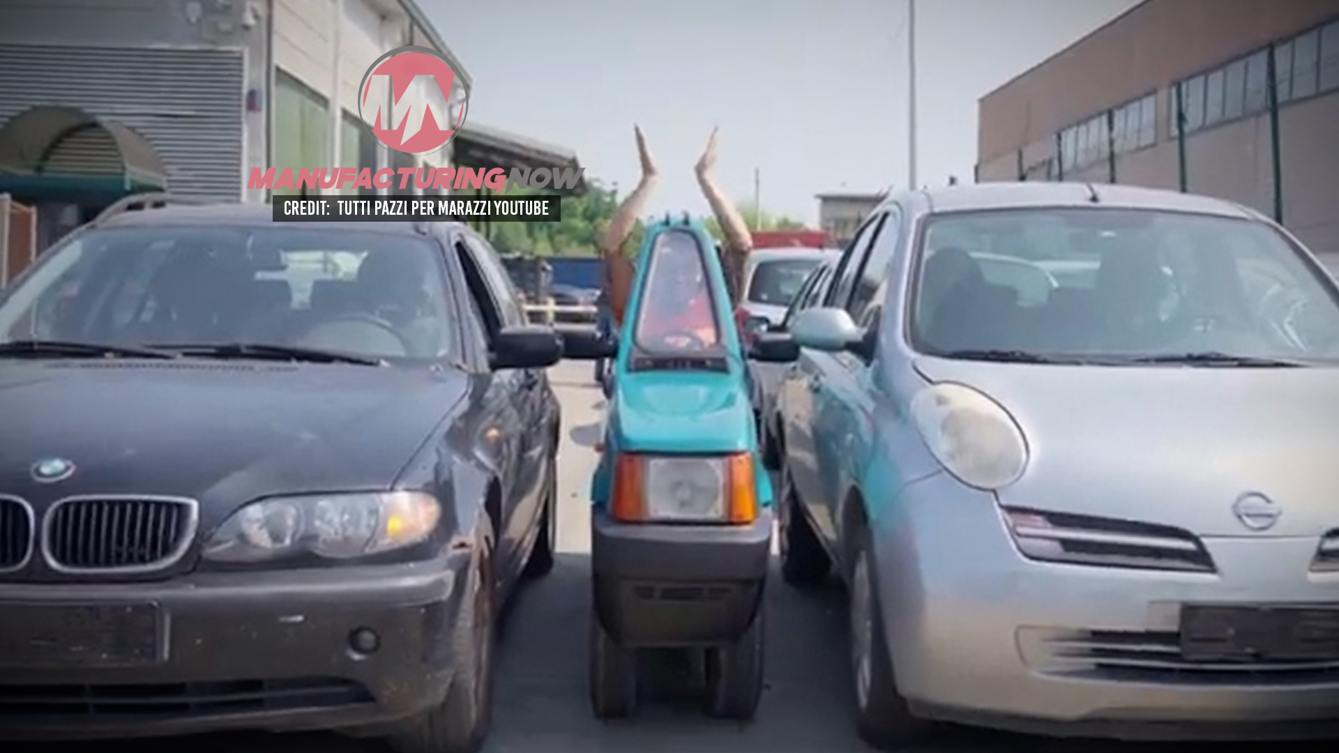 Three vehicles parked tightly in a parking lot, with a small vehicle squeezed between two cars