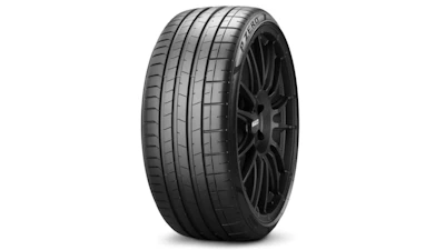 Black Pirelli performance tire with detailed tread pattern on dark alloy wheel
