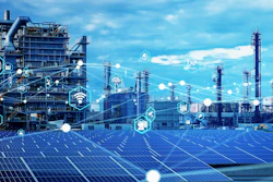 Industrial complex with solar panels, digital network icons, and blue sky backdrop