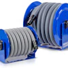 Two blue industrial hose reels with coiled gray flexible hoses