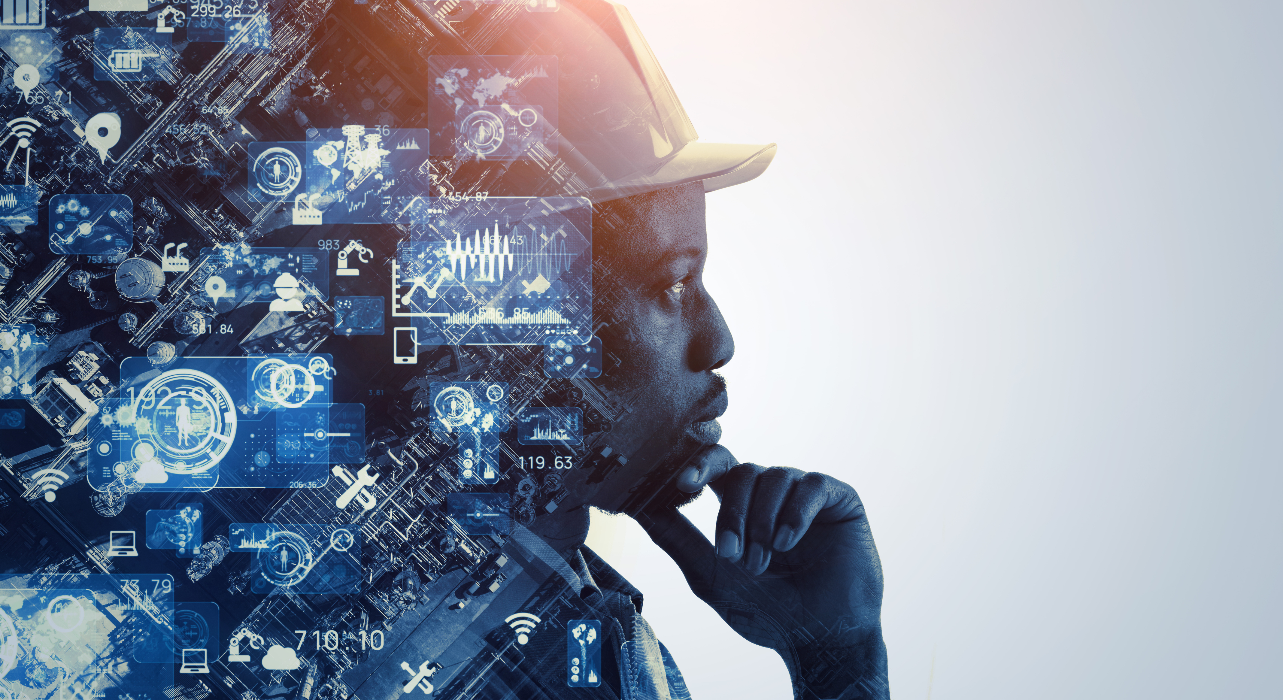 Silhouette of a person with digital technology and data visualization overlay