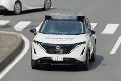 White Nissan autonomous vehicle with Propilot technology on urban road