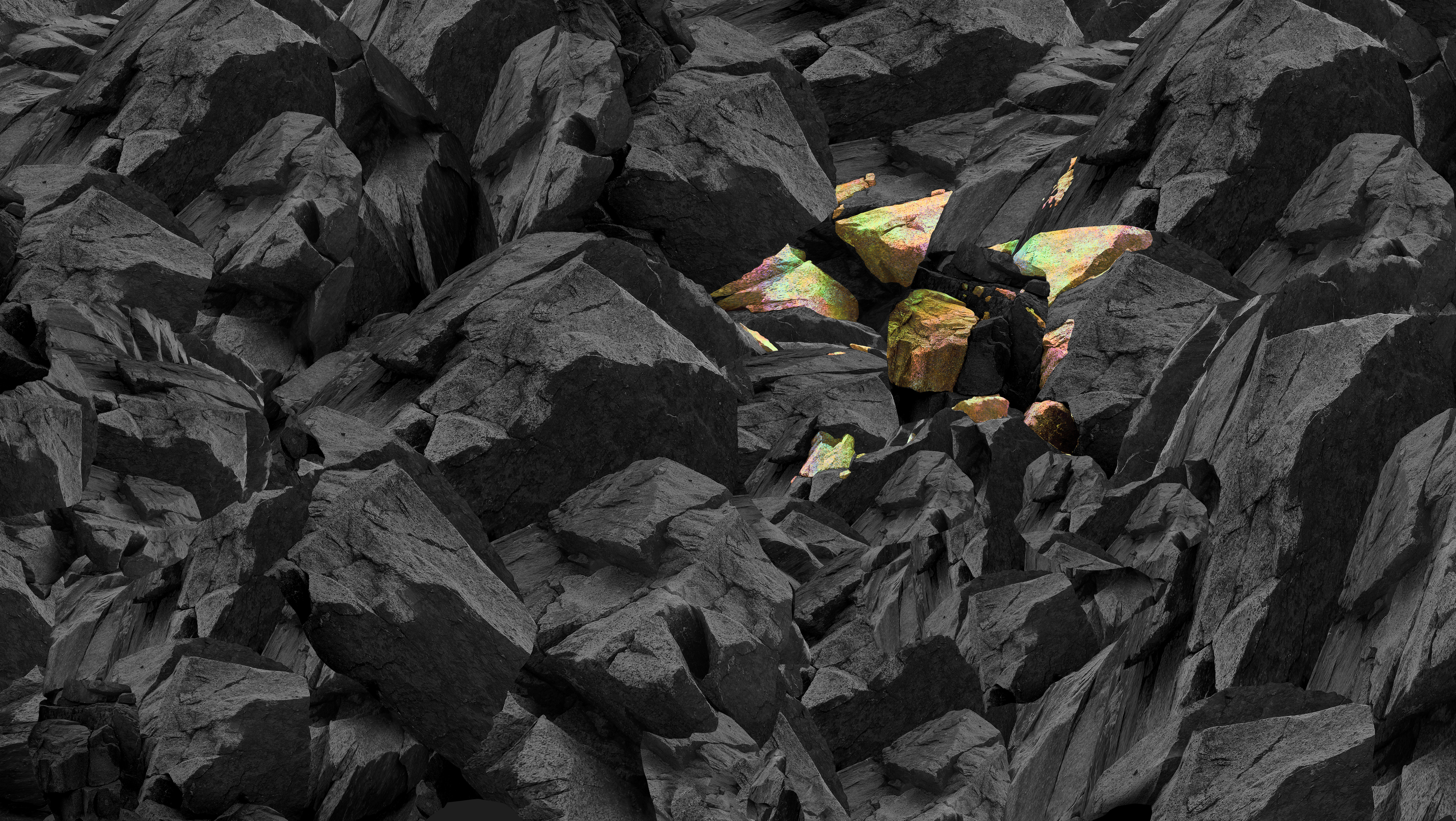 Dark rocky landscape with scattered iridescent crystal formations emerging from black stone formations