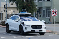 A Waymo vehicle drives past a No U-Turn sign in San Bruno, Calif., Tuesday, Sept. 30, 2025.