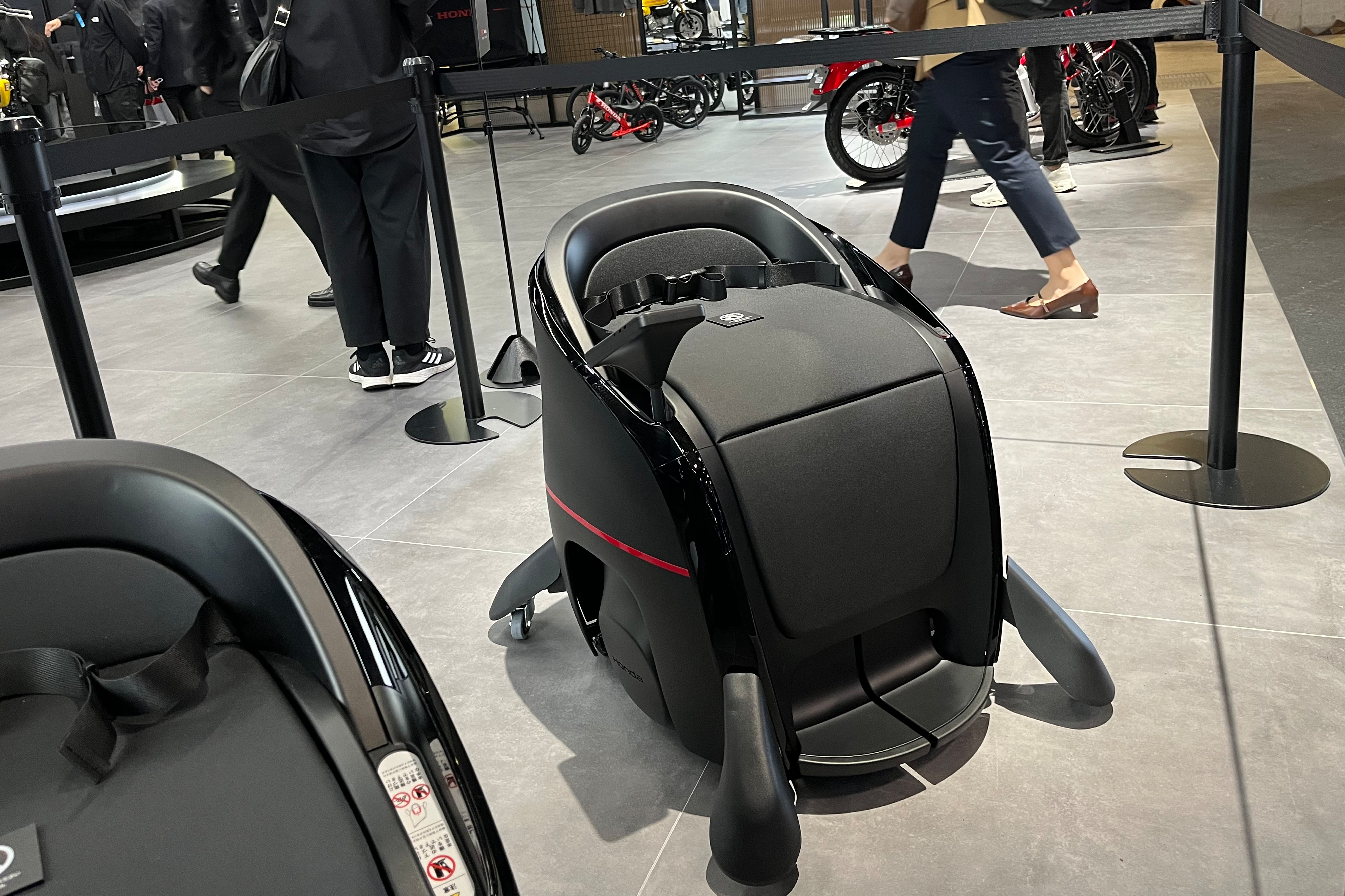 Electric personal mobility device on display at motorcycle exhibition