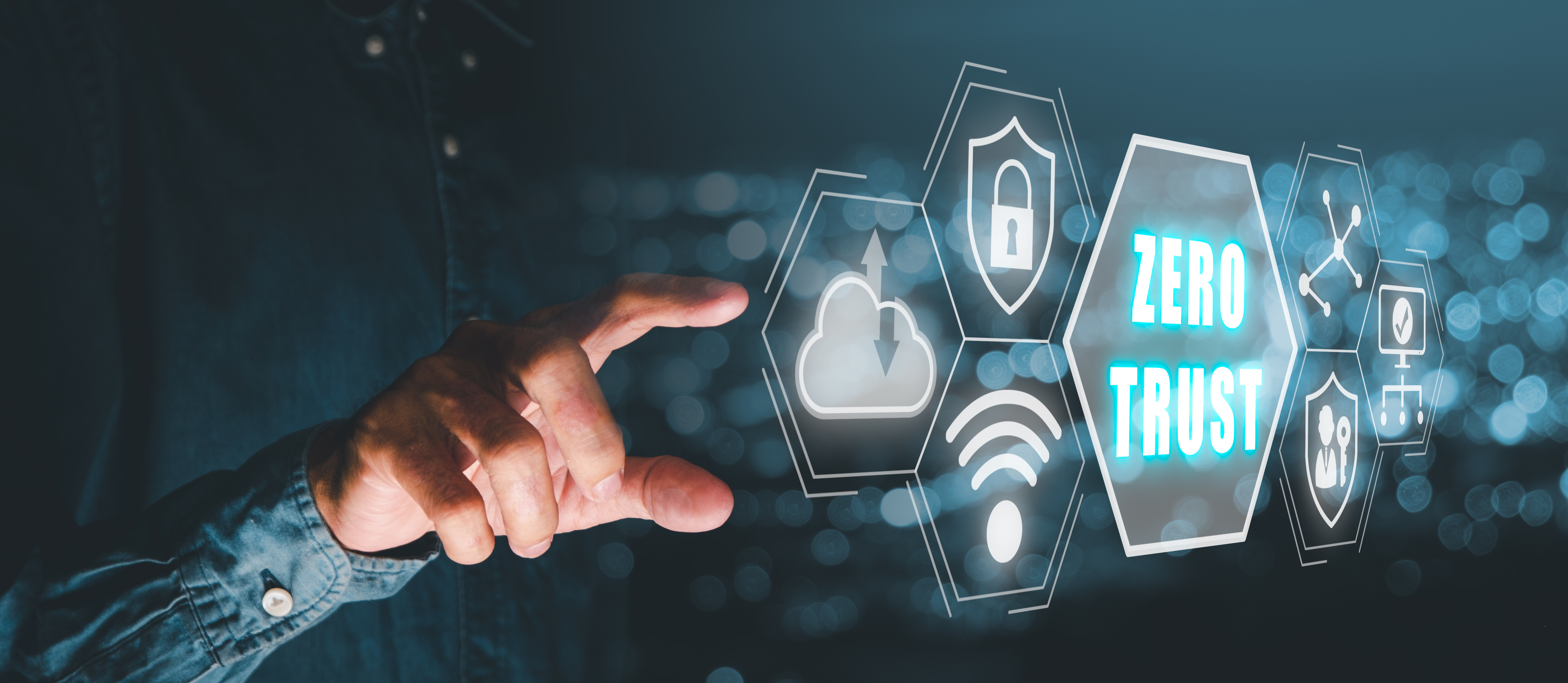 Digital hand touching hexagonal icons representing zero trust cybersecurity network