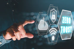 Digital hand touching hexagonal icons representing zero trust cybersecurity network
