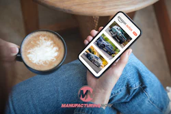 Smartphone displaying automotive content with Manufacturing Now logo and coffee