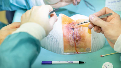 Medical professionals performing surgical procedure with surgical instruments