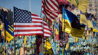 American and Ukrainian flags displayed together at memorial or solidarity event