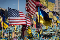 American and Ukrainian flags displayed together at memorial or solidarity event