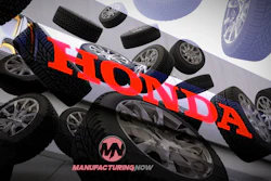 Honda automotive wheels and tires dynamically arranged with Honda logo