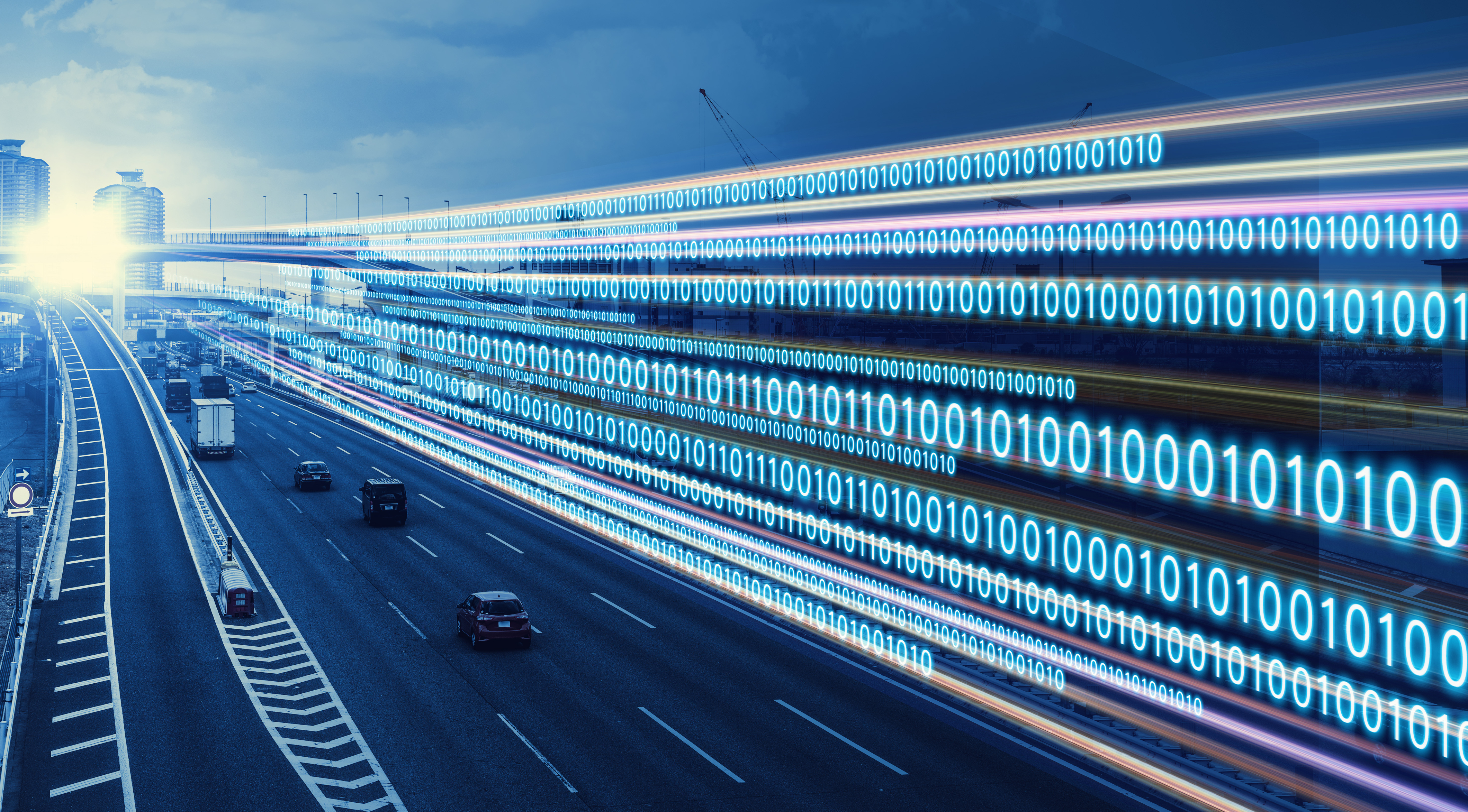Digital highway with cars and binary code streams representing data flow and technology
