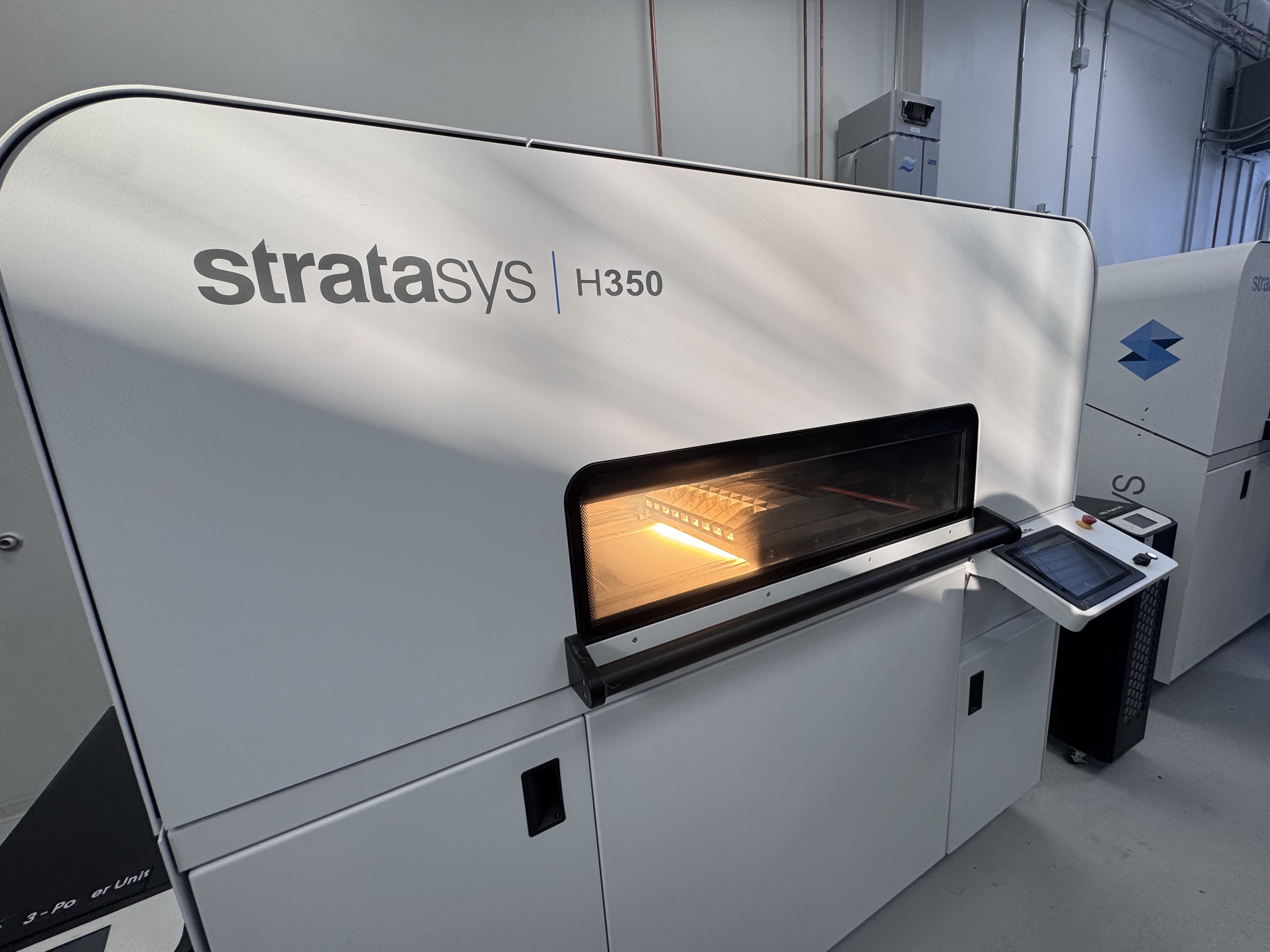 Stratasys H350 3D printer with illuminated interior chamber