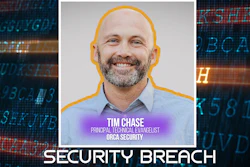 Smiling professional in blue shirt with digital security background