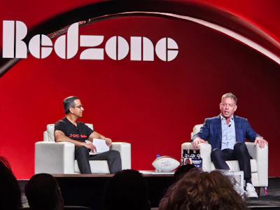 RedZone media event stage with two speakers in white chairs