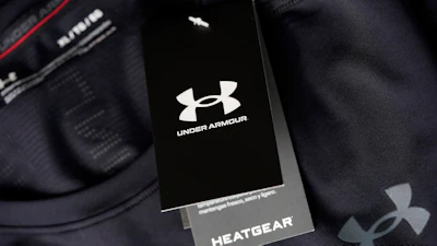 Under Armour Heatgear clothing tag with white logo on black background