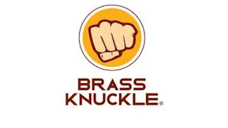 Brass Knuckle logo: Clenched fist in yellow-orange circle