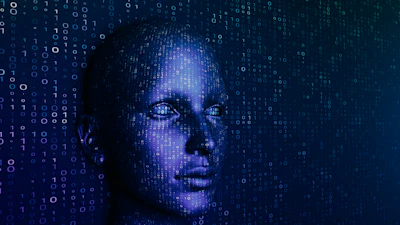 Digital human face silhouette overlaid with binary code in blue tones