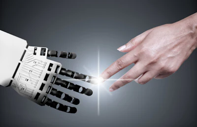 Robotic hand and human hand reaching toward each other with glowing connection point