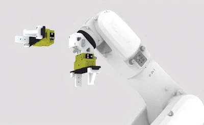 White robotic arm with modular green and black mechanical joints