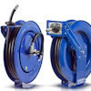 Two blue industrial hose reels with black hoses and metal fittings displayed side by side